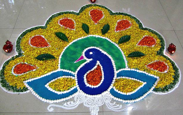 50 Admirable Peacock Rangoli designs that you can try - Wedandbeyond